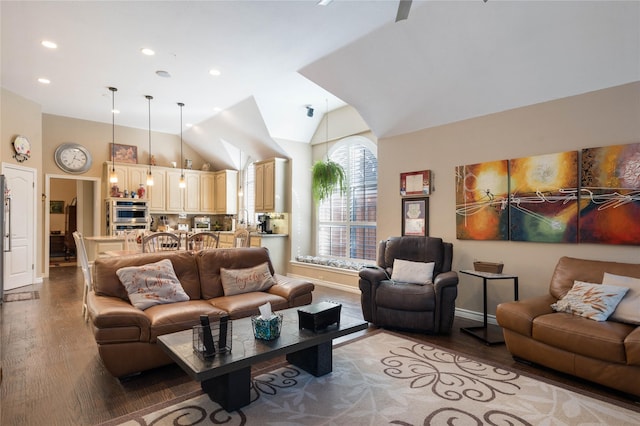living room with baseboards, vaulted ceiling, recessed lighting, and wood finished floors