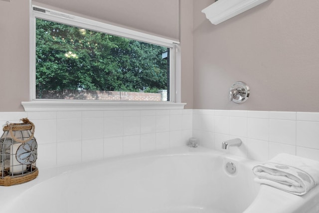 full bath with a garden tub