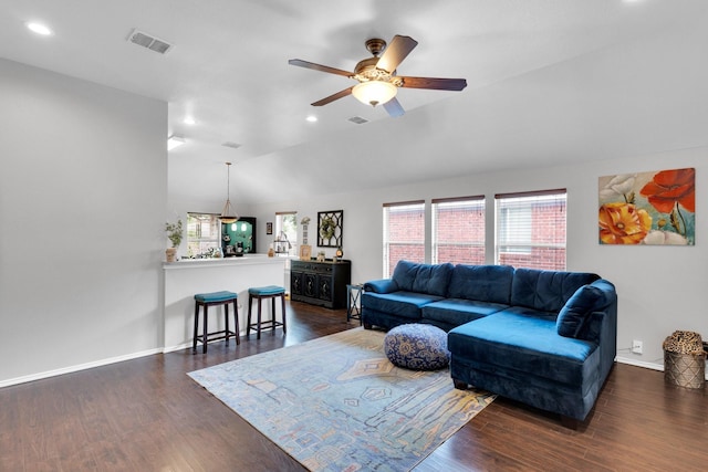 living room featuring visible vents, lofted ceiling, ceiling fan, recessed lighting, and dark wood finished floors
