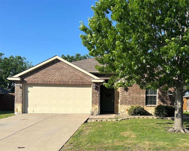 single story home with concrete driveway, brick siding, an attached garage, and stone siding