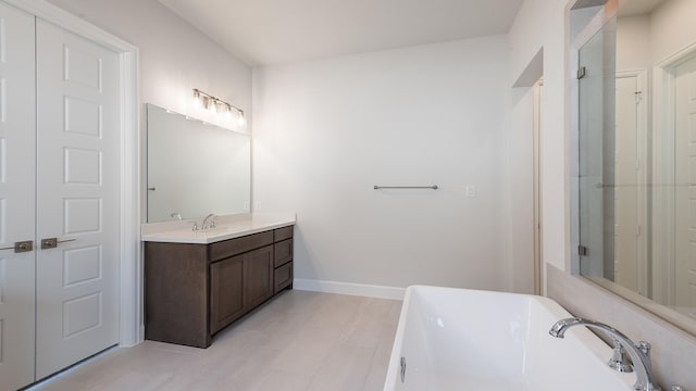 7313 Wayward Wind Dr, Fort Worth, TX 76179 - full bath with a freestanding bath, vanity, tile patterned flooring, and an enclosed shower