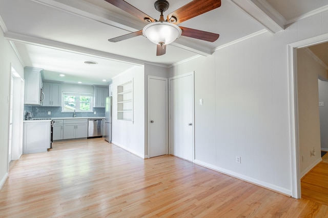 10816 Palace Way, Dallas, TX 75218 - unfurnished living room with ceiling fan, light wood finished floors, ornamental molding, a sink, and baseboards