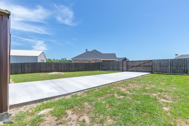 view of yard featuring a fenced backyard and a patio area