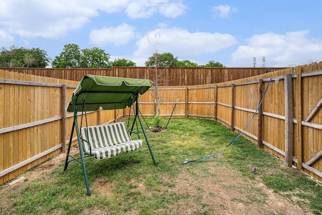 view of yard featuring a fenced backyard