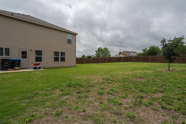 view of yard featuring fence