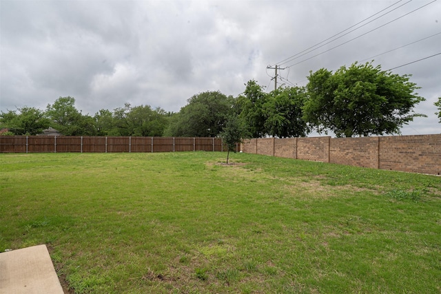 view of yard with fence