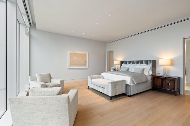 bedroom featuring light wood-style flooring