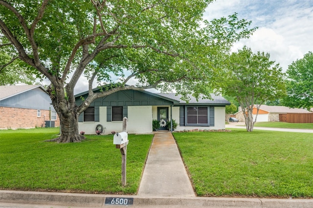 ranch-style house with a front yard