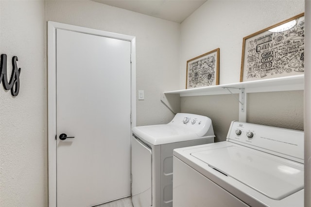laundry room with laundry area and washer and dryer
