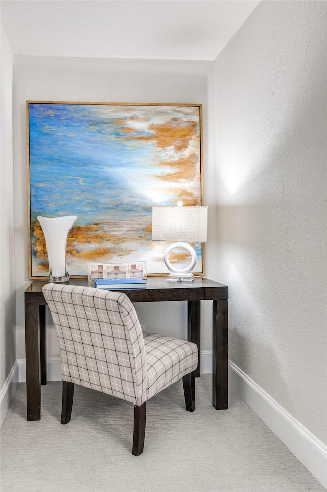 office space with carpet floors and baseboards
