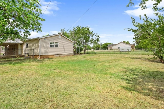 view of yard featuring fence