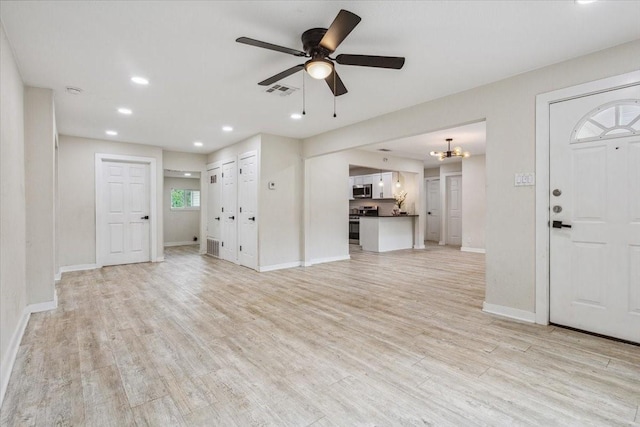 unfurnished living room with recessed lighting, baseboards, ceiling fan, and light wood-type flooring