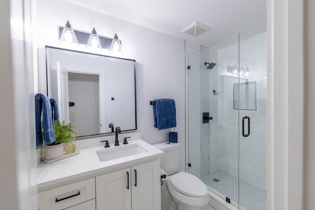 12472 Jack Pine Ct, Frisco, TX 75035 - bathroom featuring a stall shower, toilet, and vanity