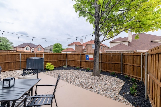 12472 Jack Pine Ct, Frisco, TX 75035 - view of patio / terrace with a fenced backyard, a residential view, and outdoor dining area