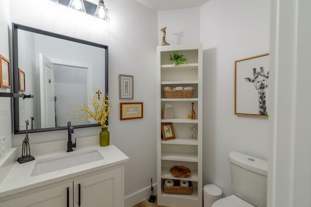 12472 Jack Pine Ct, Frisco, TX 75035 - half bath featuring toilet and vanity