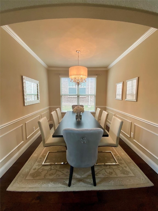 3724 Estates Way, Mckinney, TX 75072 - dining space featuring an inviting chandelier, ornamental molding, and a decorative wall
