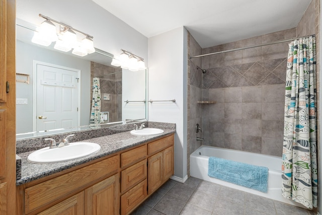 231 Granada Calle St, Granbury, TX 76049 - full bath with tile patterned floors, shower / tub combo with curtain, and double vanity