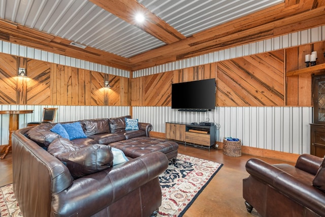 231 Granada Calle St, Granbury, TX 76049 - living area with concrete flooring and wooden walls