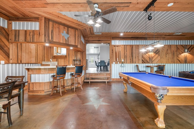 231 Granada Calle St, Granbury, TX 76049 - playroom with wood walls, concrete flooring, a ceiling fan, and billiards table