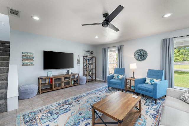 231 Granada Calle St, Granbury, TX 76049 - living room featuring healthy amount of natural light, ceiling fan, stairway, recessed lighting, and tile patterned floors