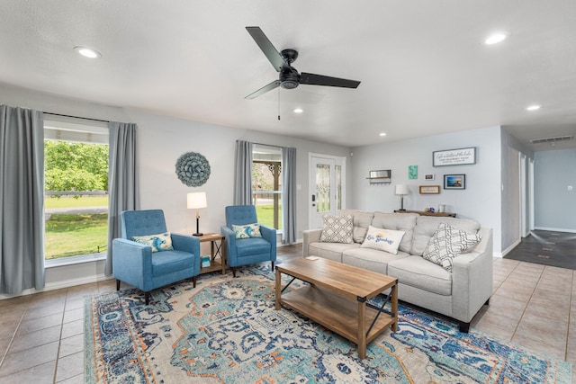 231 Granada Calle St, Granbury, TX 76049 - tiled living room with plenty of natural light, ceiling fan, recessed lighting, and baseboards