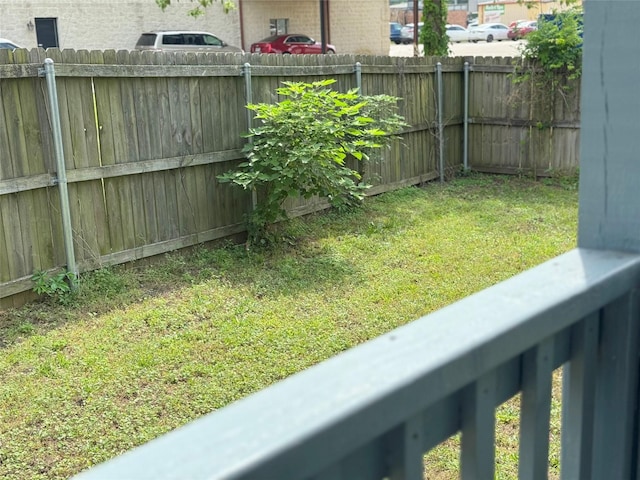 view of yard featuring a fenced backyard
