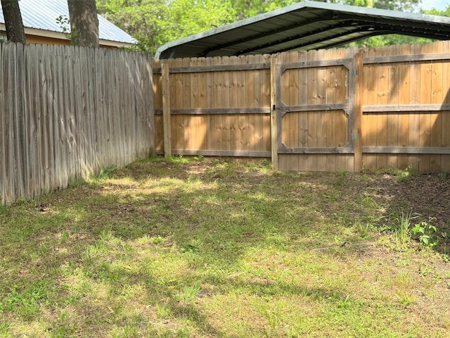 view of yard with a fenced backyard