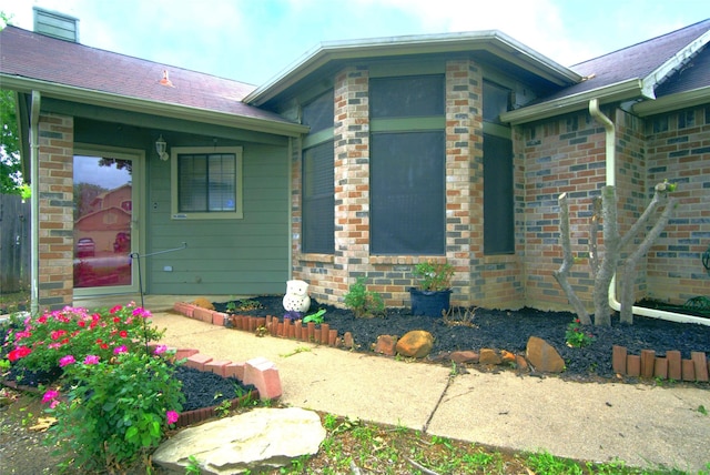 view of home's exterior with a chimney