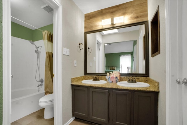 full bath with visible vents, a sink, shower / tub combo with curtain, and toilet