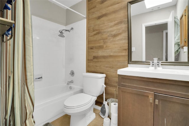 full bathroom with vanity, tile patterned floors, shower / bath combination with curtain, and toilet