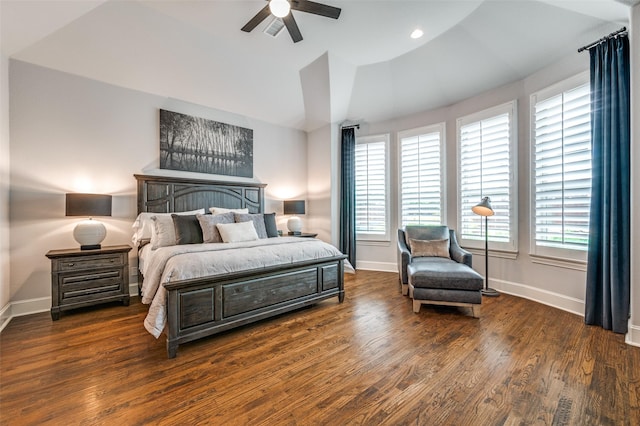 bedroom with baseboards, lofted ceiling, and multiple windows