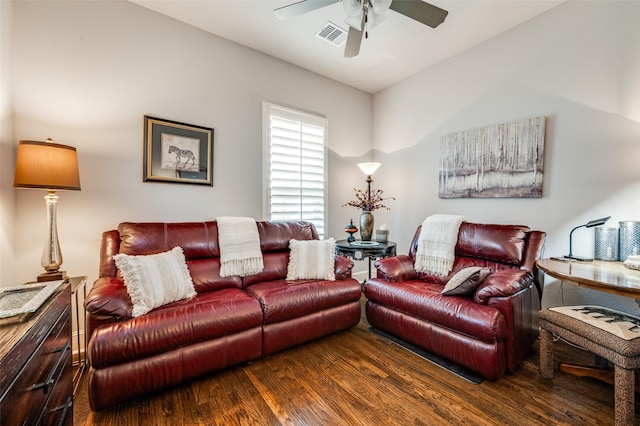 living room with a ceiling fan, wood finished floors, and visible vents