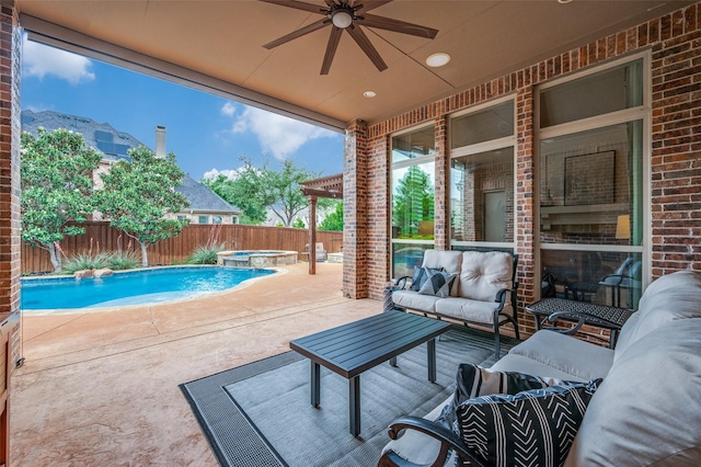 view of patio with a fenced backyard, an outdoor hangout area, a fenced in pool, a ceiling fan, and an in ground hot tub
