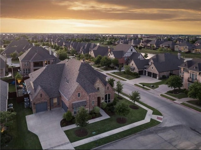 aerial view at dusk with a residential view