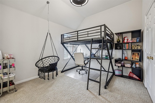 bedroom with baseboards, carpet, and lofted ceiling