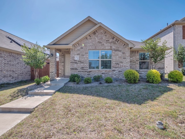 2913 Meadowlands Dr, Forney, TX 75126 - ranch-style house featuring brick siding and a front yard