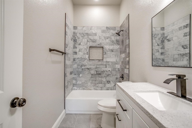 full bath with shower / bath combination, tile patterned flooring, vanity, baseboards, and toilet