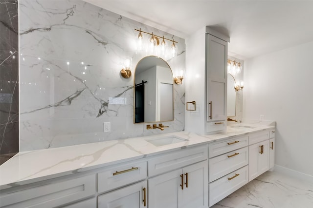 7335 Royal Cir, Dallas, TX 75230 - bathroom with double vanity, a sink, and marble finish floor