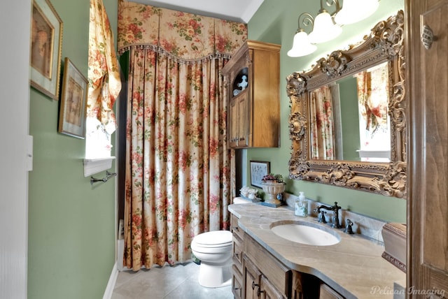1860 Leonard Rd, Shreveport, LA 71115 - bathroom featuring tile patterned floors, toilet, vanity, and a shower with curtain