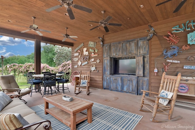 view of patio with ceiling fan, an outdoor hangout area, and outdoor dining space