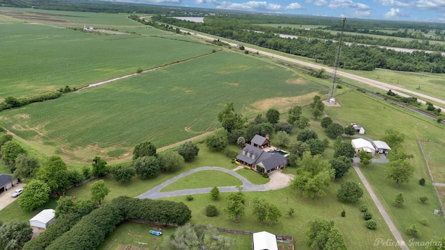 birds eye view of property with a rural view