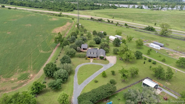 drone / aerial view featuring a water view and a rural view