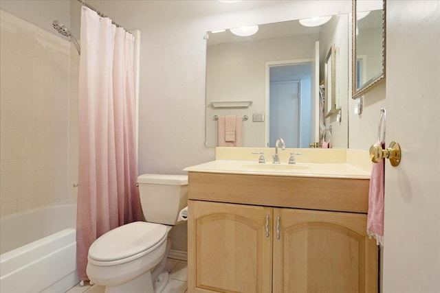 2231 E Peters Colony Rd, Carrollton, TX 75007 - full bathroom featuring toilet, vanity, shower / tub combo, and tile patterned flooring
