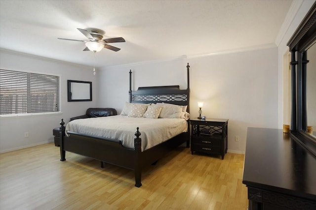 2231 E Peters Colony Rd, Carrollton, TX 75007 - bedroom with light wood-style flooring, ornamental molding, baseboards, and a ceiling fan