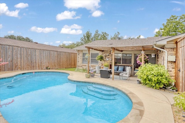 2231 E Peters Colony Rd, Carrollton, TX 75007 - view of swimming pool with a pergola, a patio area, an outdoor hangout area, and a fenced backyard