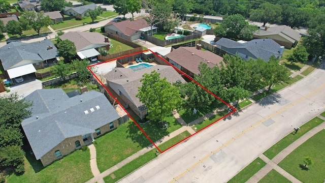 2231 E Peters Colony Rd, Carrollton, TX 75007 - aerial perspective of suburban area featuring property parcel outlined
