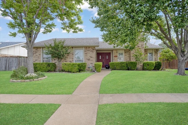 2231 E Peters Colony Rd, Carrollton, TX 75007 - view of front of property featuring brick siding and a shingled roof
