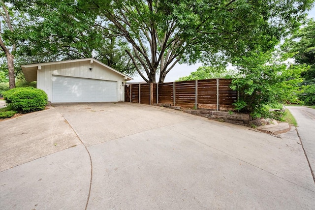 detached garage with fence