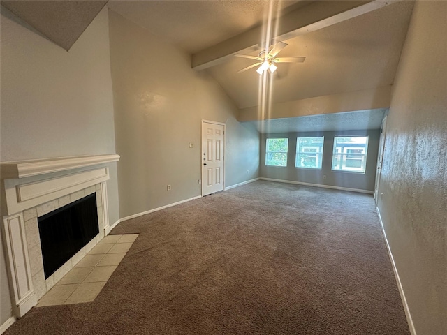 unfurnished living room featuring ceiling fan, a fireplace, carpet floors, baseboards, and lofted ceiling with beams