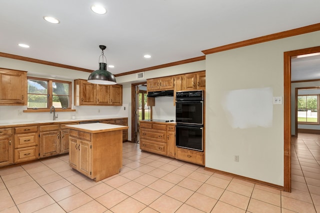 kitchen with dobule oven black, visible vents, light countertops, a sink, and recessed lighting